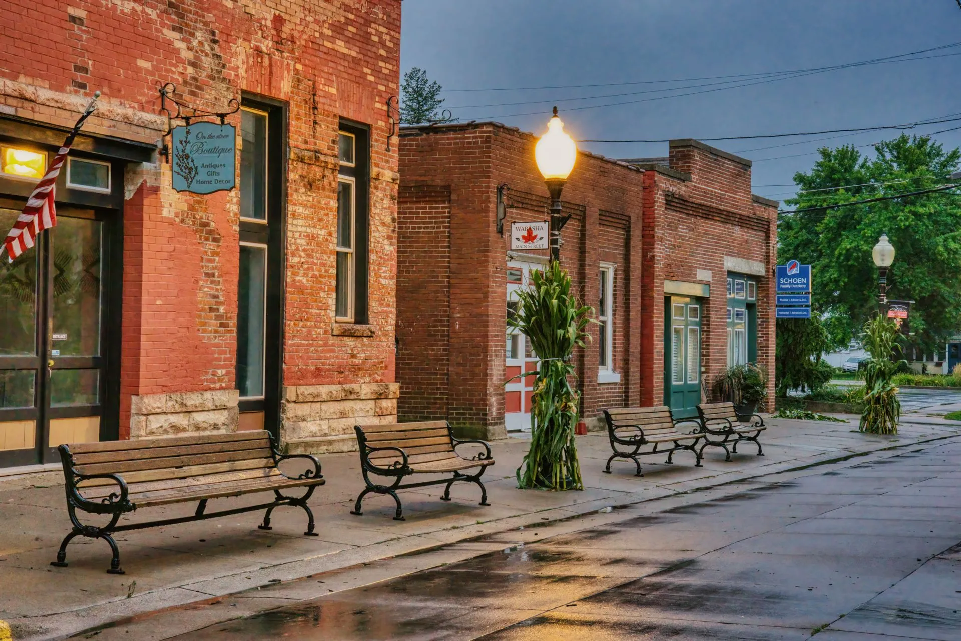 A historic Main Street of local member businesses at dusk